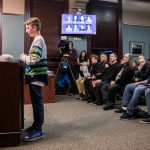 Rhys Stenhouse, 13, speaks to the Everett City Council and encourages them to build a new stadium by quoting 'Field of Dreams' during public comment before the council's vote on the stadium site location on Wednesday, Dec. 18, 2024 in Everett, Washington. (Olivia Vanni / The Herald)
