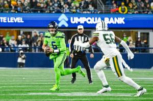 Seahawks quarterback Sam Howell (6) prepares to throw a pass against the Green Bay Packers at Lumen Field on Sunday, Dec. 15, 2024. (Photo courtesy of Edwin Hooper / Seattle Seahawks)