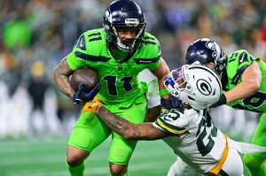Seahawks wide receiver Jaxon Smith-Njigba (11) run with the ball against the Green Bay Packers at Lumen Field on Sunday, Dec. 15, 2024. (Photo courtesy of the Seattle Seahawks)