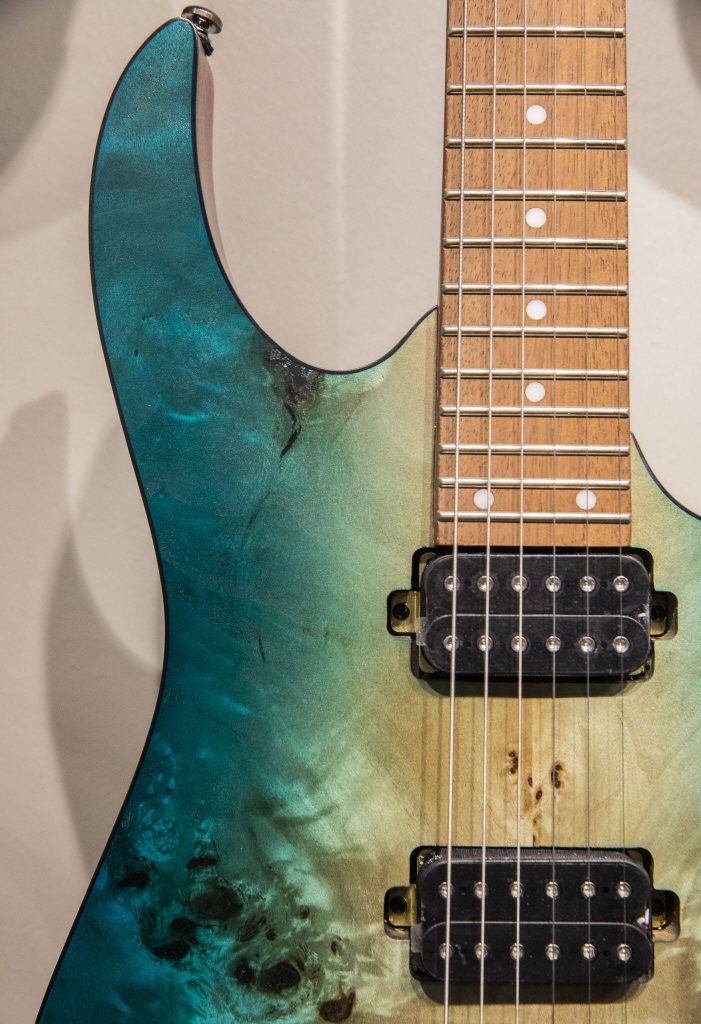 A blue ombre finish on a guitar for sale at Kennelly Keys on Oct. 17, 2024 in Everett, Washington. (Olivia Vanni / The Herald)