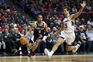 Gonzaga Bulldogs guard Ryan Nembhard (0) drives toward the hoop against St. Marys Gaels guard Augustas Marciulionis (3) during the first half of an NCAA college basketball championship game in the West Coast Conference mens tournament at Orleans Arena on Tuesday, March 12, 2024, in Las Vegas. (Ellen Schmidt / Las Vegas Review-Journal / Tribune News Services)