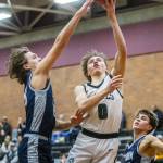 Jacksons Jackson Rabe gets his layup blocked during the game against Squalicum on Friday, Dec. 27, 2024 in Mountlake Terrace, Washington. (Olivia Vanni / The Herald)