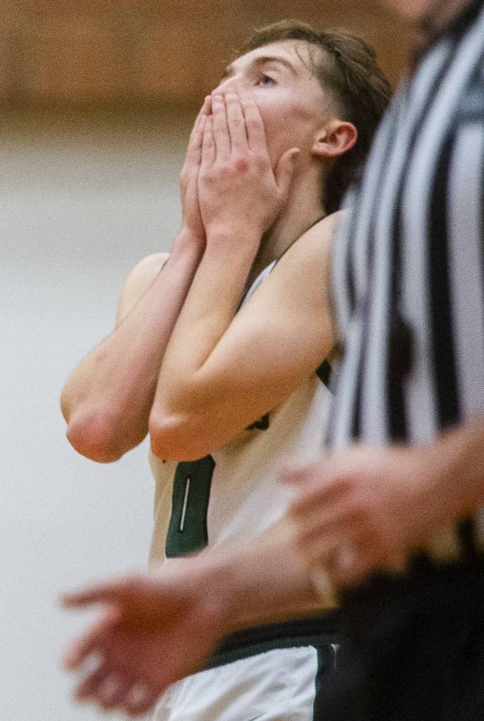 Jacksons Jackson Rabe reacts to a foul call during the game against Squalicum on Friday, Dec. 27, 2024 in Mountlake Terrace, Washington. (Olivia Vanni / The Herald)