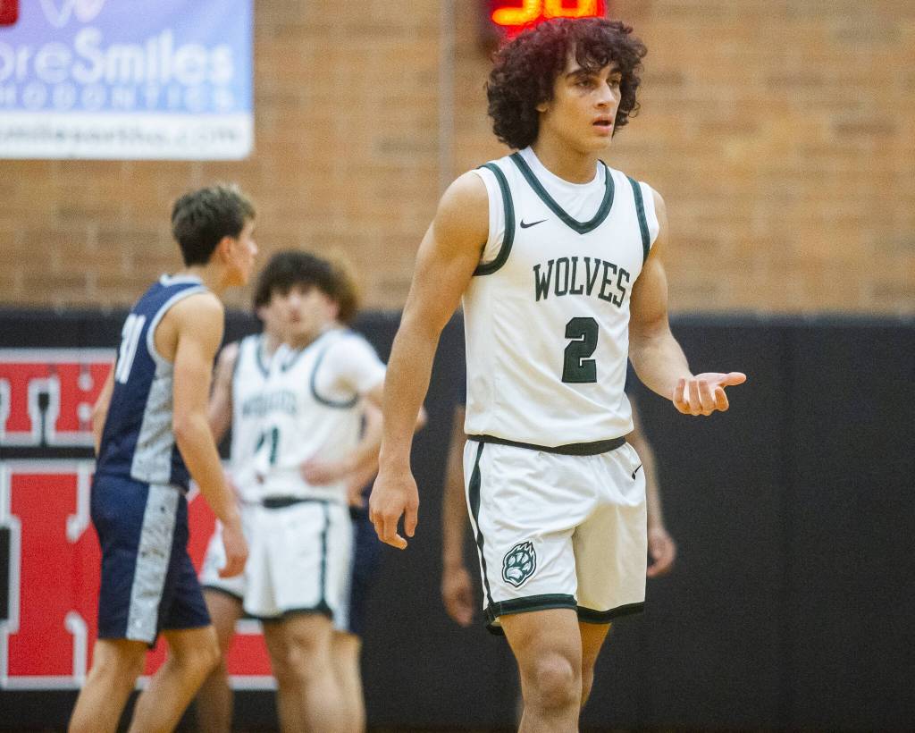 Jacksons Seamus Williams reacts to fouling out of the game against Squalicum on Friday, Dec. 27, 2024 in Mountlake Terrace, Washington. (Olivia Vanni / The Herald)