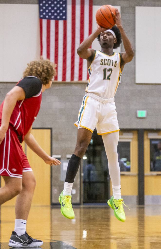 Shorecrests Junior Kagarabi makes a three point shot during the game against Cascade on Monday, Dec. 30, 2024 in Shoreline, Washington. (Olivia Vanni / The Herald)