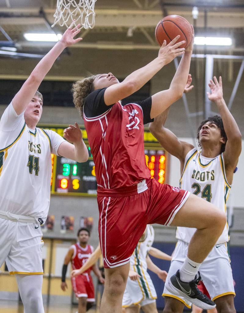 Cascades Gavin Wright attempts a layup during the game against Shorecrest on Monday, Dec. 30, 2024 in Shoreline, Washington. (Olivia Vanni / The Herald)