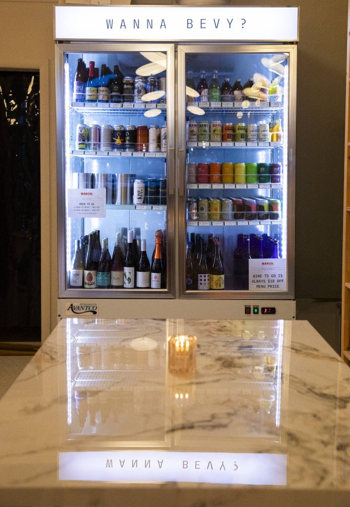 The to-go beer and wine selection at Marcel on Dec. 19 in Everett. (Olivia Vanni / The Herald)