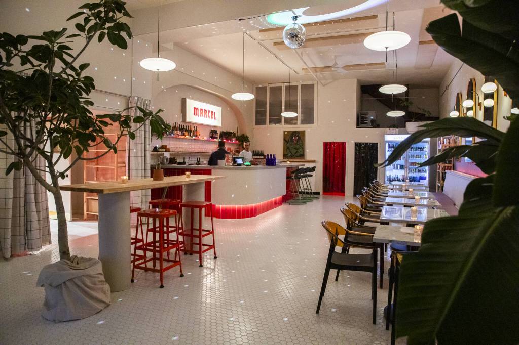 A disco ball fills Marcel with speckles of light Dec. 19 in Everett. (Olivia Vanni / The Herald)