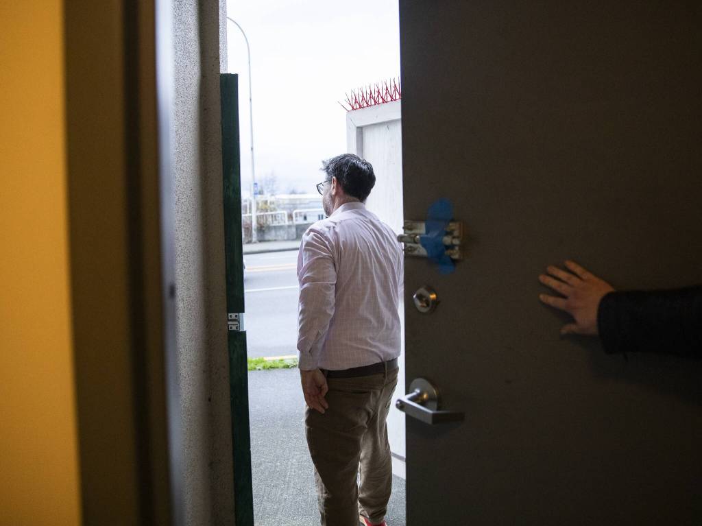 Jeremy Reed shows his business only access to Hewitt Avenue on Monday, Dec. 30, 2024, in Everett, Washington. (Olivia Vanni / The Herald)