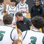 Jackson head coach Steve Johnson runs through a play with his team during a timeout on Friday, Dec. 27, 2024 in Mountlake Terrace, Washington. (Olivia Vanni / The Herald)