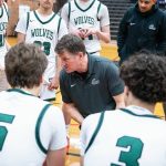 Jackson head coach Steve Johnson runs through a play with his team during a timeout on Friday, Dec. 27, 2024 in Mountlake Terrace, Washington. (Olivia Vanni / The Herald)