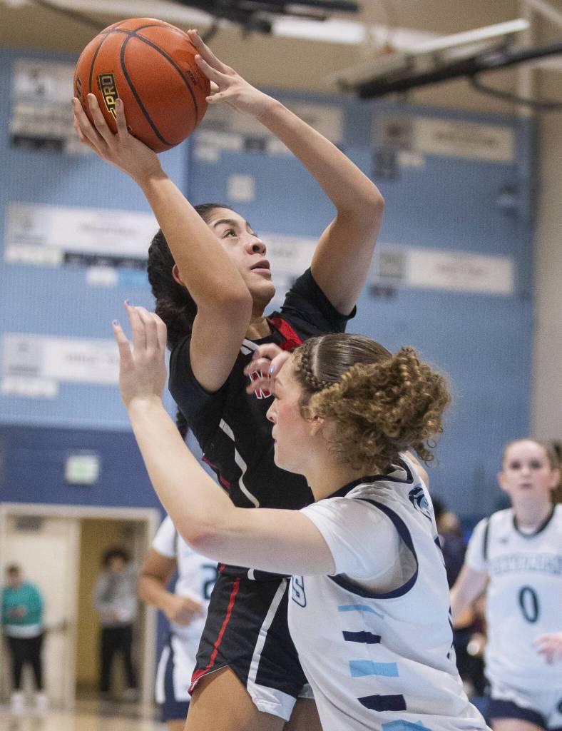 Archbishop Murphys Ashley Fletcher makes a layup during the game against Meadowdale on Friday, Jan. 3, 2025 in Lynnwood, Washington. (Olivia Vanni / The Herald)