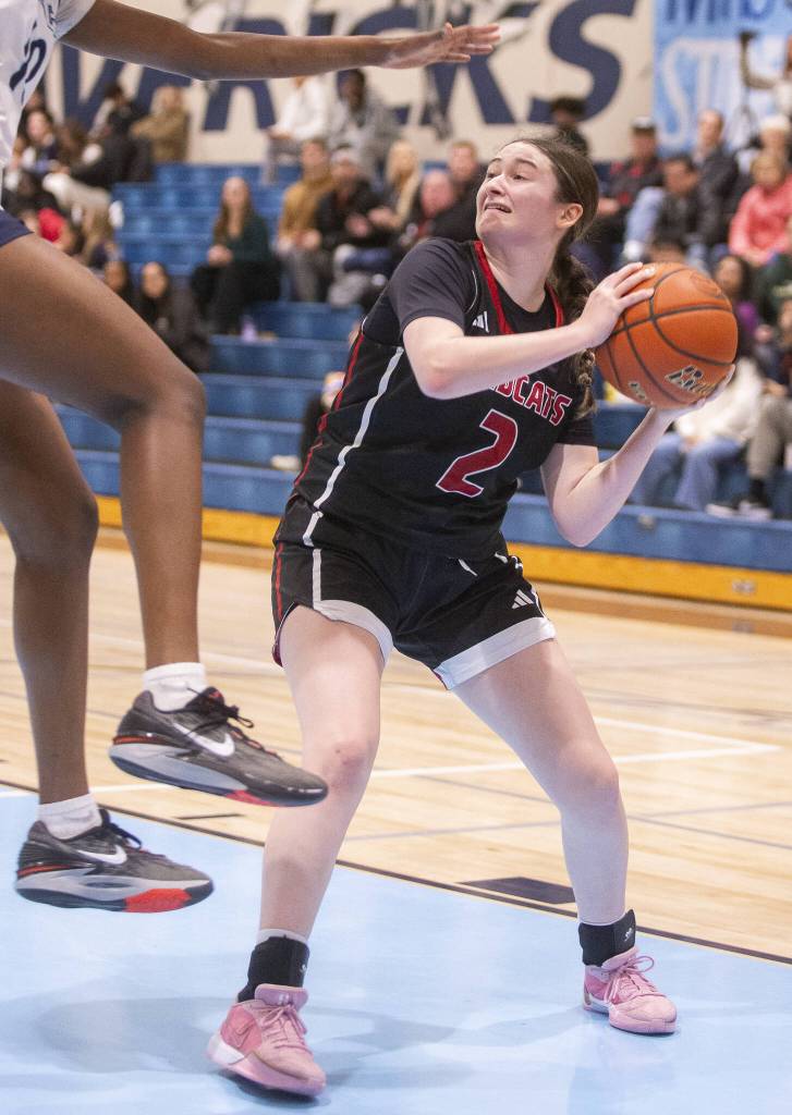 Archbishop Murphys Brooke Blachly looks for an open shot during the game against Meadowdale on Friday, Jan. 3, 2025 in Lynnwood, Washington. (Olivia Vanni / The Herald)