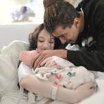 Amber-Lynne Rickett and Steffen Horne, of Lynnwood, welcome Jheneah Elowyn Horne, the first baby born at Swedish Edmonds in 2025. (Provided photo)