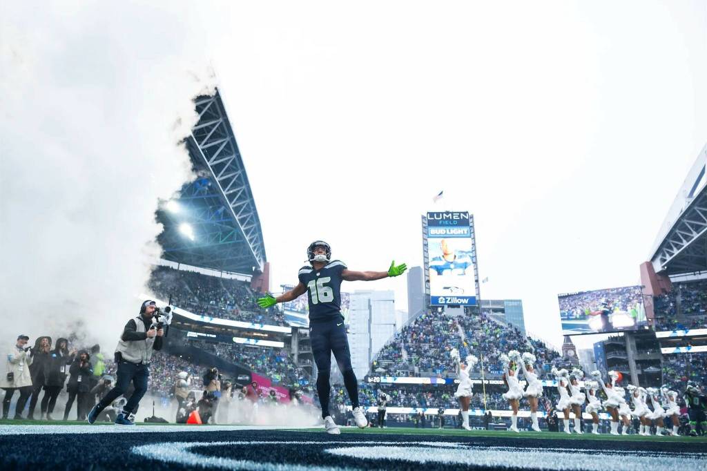 Seahawks receiver Tyler Lockett (16) soaks in applause from fans as hes introduced with the offensive starters at Lumen Field on Sunday, Dec. 22, 2024. (Photo courtesy of Rod Mar / Seattle Seahawks)