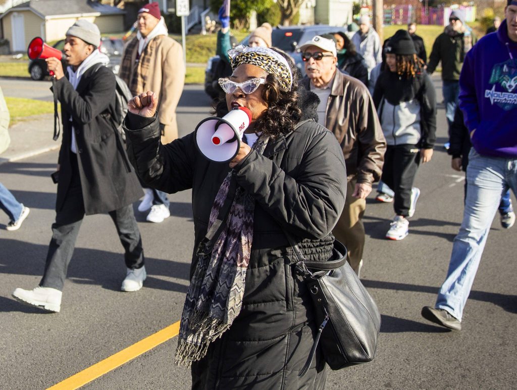 DanVonique Bletson-Reed helps lead those marching in song and chants during an annual Martin Luther King Jr. Day march on Monday, Jan. 20, 2025 in Everett, Washington. (Olivia Vanni / The Herald)