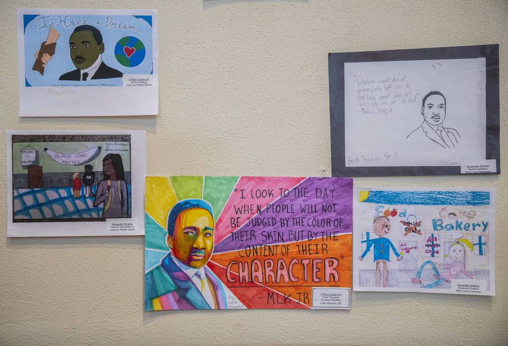 Martin Luther King Jr. Day-themed artwork from local elementary school students on display at the Carl Gipson Center during the Greater Everett Rev. Dr. Martin Luther King Jr. Day Community Celebration on Monday, Jan. 20, 2025 in Everett, Washington. (Olivia Vanni / The Herald)