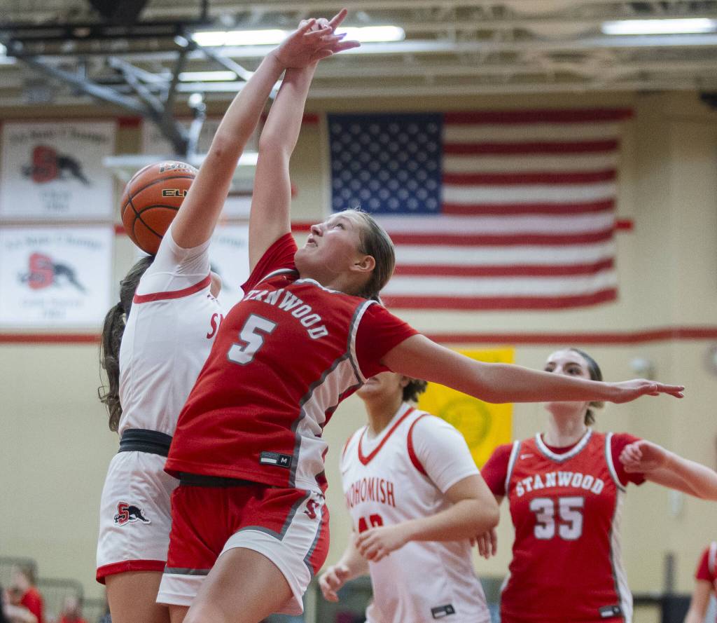 Stanwoods Ava DePew get the ball knocked out of her hand while trying to make a shot during the game against Snohomish on Thursday, Jan. 9, 2025 in Snohomish, Washington. (Olivia Vanni / The Herald)