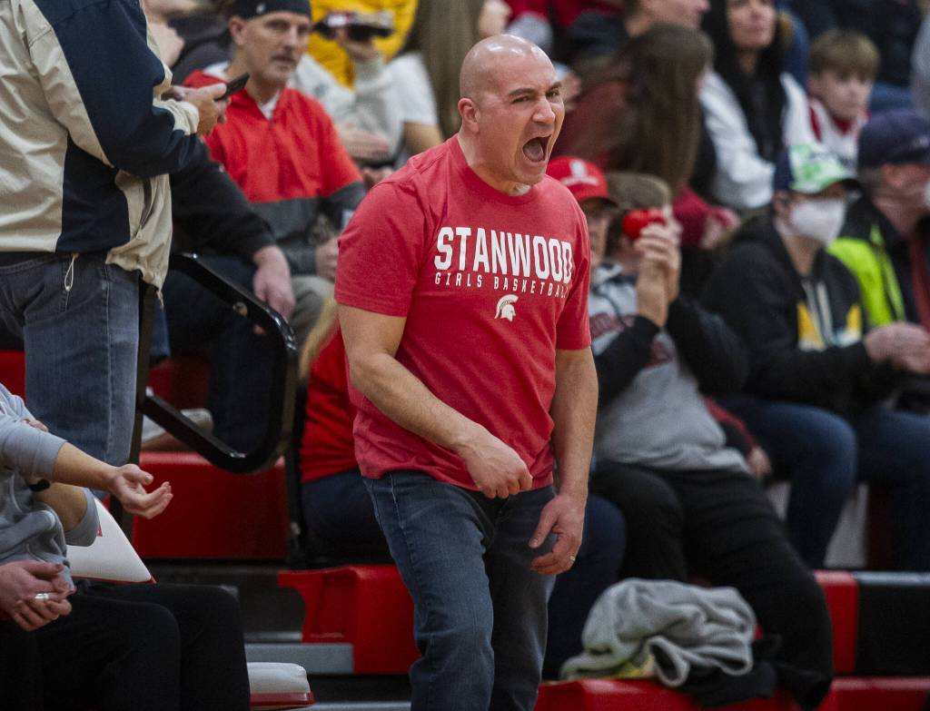 Stanwood head coach Dustin Swanson yells about what he thinks was a missed call by the referees during the game against Snohomish on Thursday, Jan. 9, 2025 in Snohomish, Washington. (Olivia Vanni / The Herald)