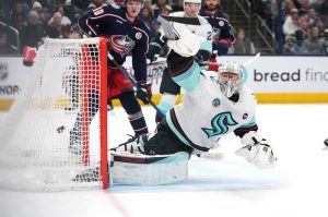 Seattle Kraken goaltender Philipp Grubauer (31) attempts to block a shot by the Columbus Blue Jackets' Zach Werenski, not pictured, during the second period at Nationwide Arena on Thursday, Jan. 9, 2025, in Columbus, Ohio. (Jason Mowry / Getty Images / Tribune News Services)