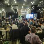 People listen to APEX founder John Carswell speak during an Greater Everett Chamber of Commerce kick-off event on Wednesday, Jan. 15, 2025, in Everett, Washington. (Olivia Vanni / The Herald)