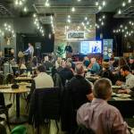 People listen to APEX founder John Carswell speak durning an Greater Everett Chamber of Commerce kick off event on Wednesday, Jan. 15, 2025 in Everett, Washington. (Olivia Vanni / The Herald)