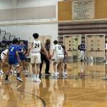 Edmonds-Woodway and Shorewood boys basketball prepare for tip-off during a league game on Jan. 14, 2025 at Edmonds-Woodway High School. (Qasim Ali / The Herald)
