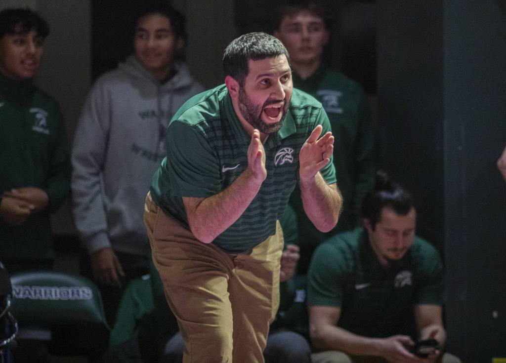 Edmonds-Woodway coach Brian Alfi calls out instructions during the match on Thursday, Jan. 16, 2025 in Edmonds, Washington. (Olivia Vanni / The Herald)
