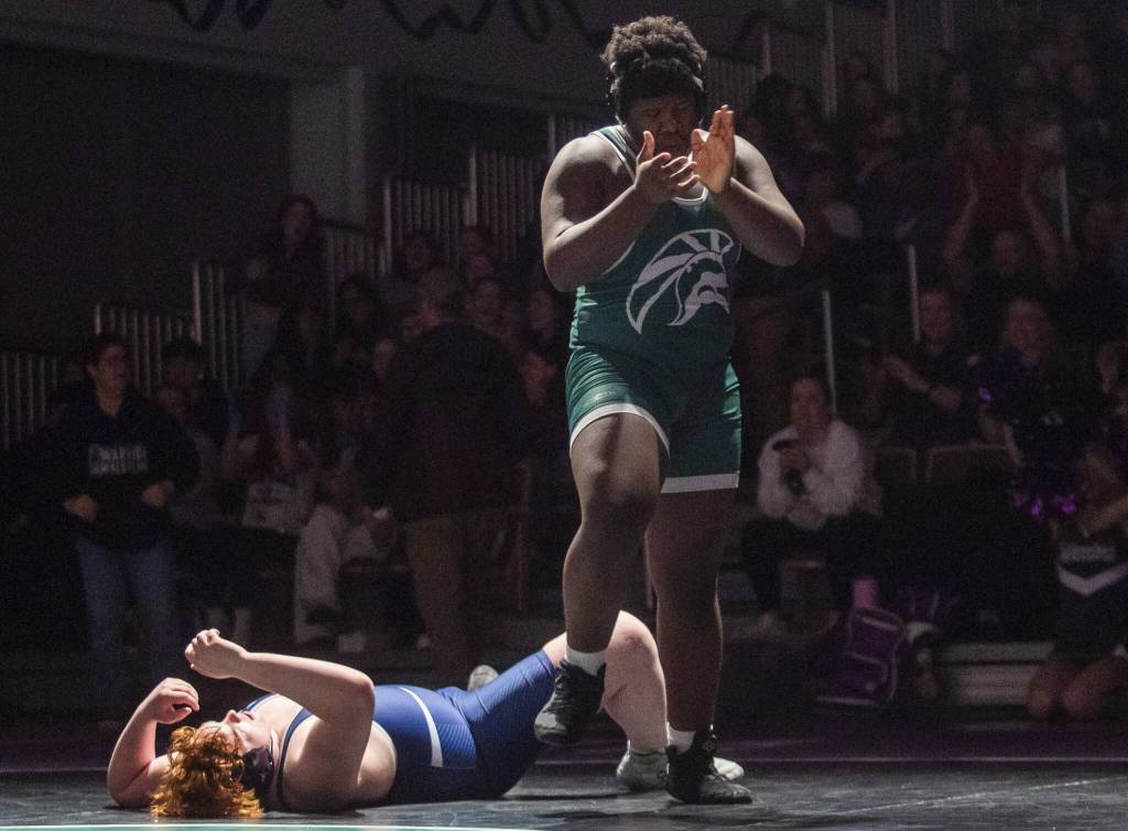 Edmonds-Woodways Edson Belizaire reacts to beating Meadowdales Jaxson Hulbert in the 285-pound match on Thursday, Jan. 16, 2025 in Edmonds, Washington. (Olivia Vanni / The Herald)