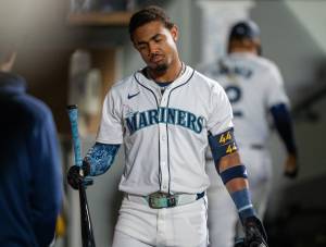 Julio Rodriguez of the Seattle Mariners reacts in the dugout after striking out during the fifth inning against the New York Yankees at T-Mobile Park in Seattle on Sept. 18, 2024. (Stephen Brashear / Getty Images / Tribune News Services)
