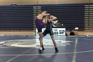 Glacier Peak 126-pound wrestler Garrett Taylor attempts a takedown of Lake Stevens Gavin Ketchum during a Jan. 21, 2025 league dual meet at Glacier Peak High School. (Qasim Ali / The Herald)
