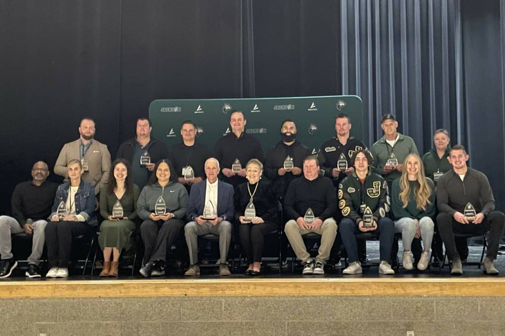Jacksons inaugural class for its Athletic Hall of Fame assembles on the schools stage in Mill Creek on Jan. 17, 2025. (Aaron Coe / The Herald)