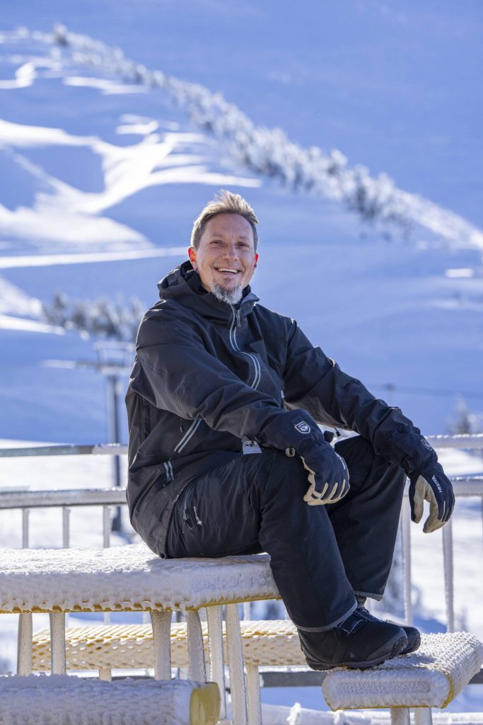 Dan Cochrane, a local snowboarder, at Mt. Bachelor Ski Resort in Bend, Oregon, Jan. 11. Mt. Bachelor is one of the largest ski areas in North America. Powdr, the owner for 25 years, announced last summer that it was putting it up for sale. Locals saw a chance to get it back. (Ruth Fremson/The New York Times)