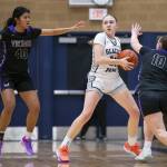 Glacier Peaks Rikki Miller tries to keep possession of the ball while looking for an open teammate to pas to during the game against Lake Stevens on Friday, Jan. 24, 2025 in Snohomish, Washington. (Olivia Vanni / The Herald)