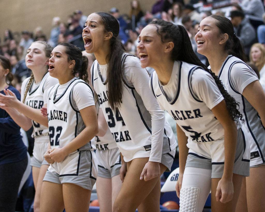 The Glacier Peak bench reacts to a foul call during the game against Lake Stevens on Friday, Jan. 24, 2025 in Snohomish, Washington. (Olivia Vanni / The Herald)