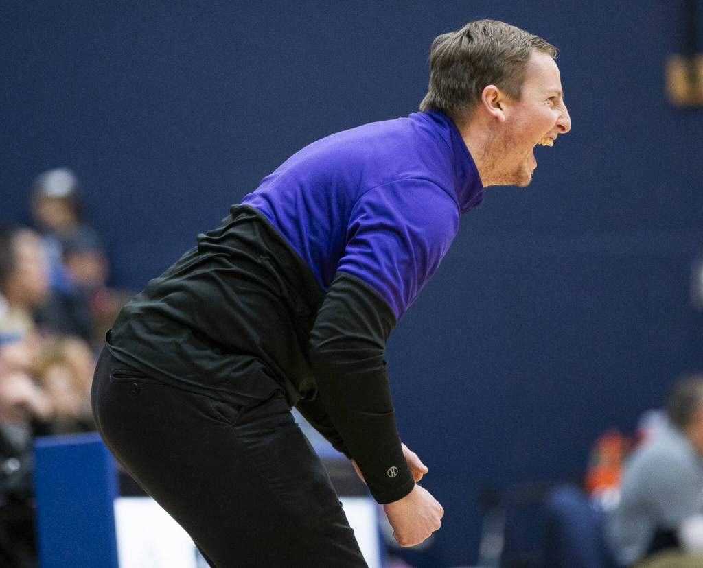 Lake Stevens head coach Seth Doge reacts to his team pull ahead during the game against Glacier Peak on Friday, Jan. 24, 2025 in Snohomish, Washington. (Olivia Vanni / The Herald)