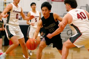 Marysville Getchells Bubba Palacol makes his way to the hoop against Cedarcrest on Tuesday, Jan. 16, 2024, at Cedarcrest High School in Duvall, Washington. (Ryan Berry / The Herald)