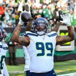 Seahawks defensive end Leonard Williams celebrates after his 92-yard pick-6 in Seattle's 26-16 win over the New York Jets at MetLife Stadium on Dec. 1, 2024. (Photo courtesy of Edwin Hooper / Seattle Seahawks)