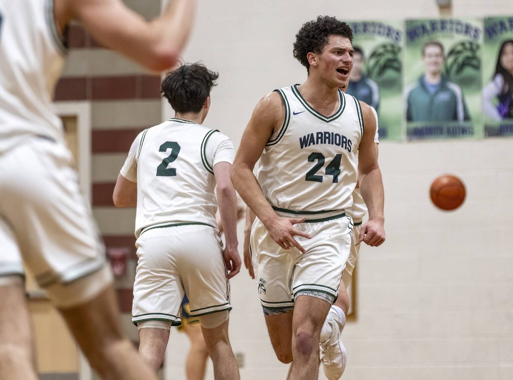 Edmonds-Woodways Julian Gray reacts to a 3-point shot during the game against Shorecrest on Tuesday, Jan. 28, 2025 in Edmonds, Washington. (Olivia Vanni / The Herald)