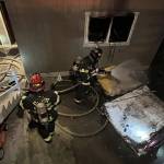 Everett firefighters on the scene of a fatal fire Tuesday night in Everett. (Everett Fire Department)