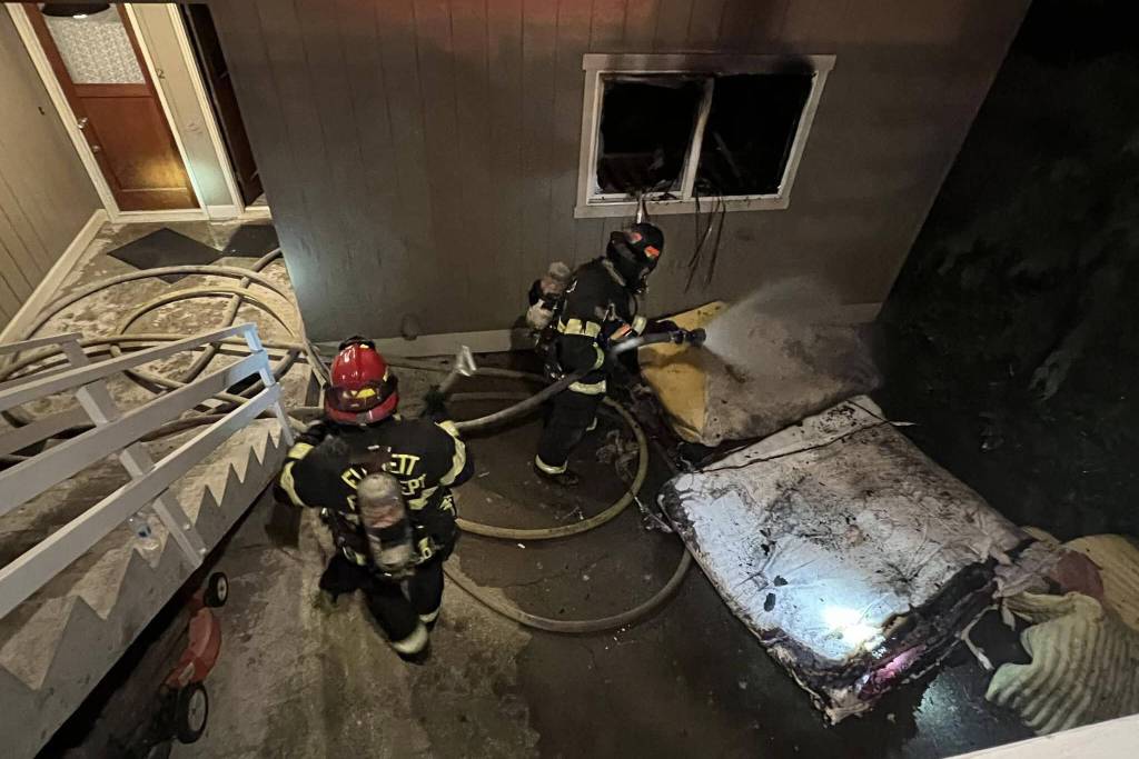 Everett firefighters on the scene of a fatal fire Tuesday night in Everett. (Everett Fire Department)