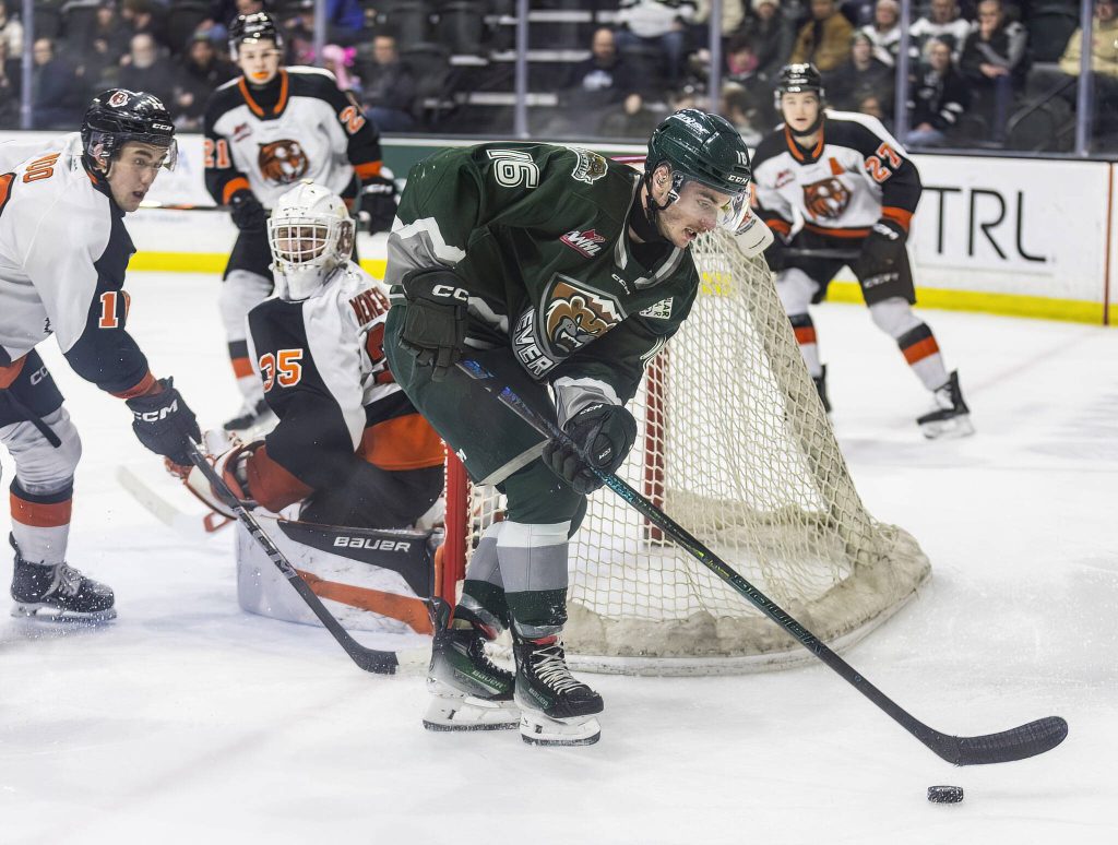 Slivertips Dominik Rymon skates after a loose puck behind the goal during the game against the Medicine Hat Tigers on Wednesday, Jan. 29, 2025 in Everett, Washington. (Olivia Vanni / The Herald)