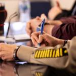 Snohomish County Sheriff Susanna Johnson takes notes during a roundtable discussion Thursday at Everett Station.