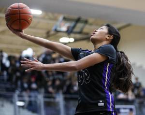 Lake Stevens’ Noelani Tupua makes a layup during the game against Glacier Peak on Friday, Jan. 24, 2025 in Snohomish, Washington. (Olivia Vanni / The Herald)