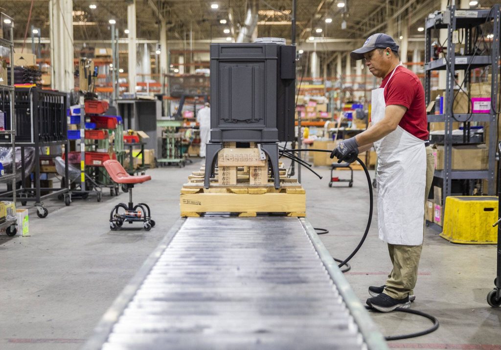 Gas fireplaces being worked on inside Travis Industries House of Fire factory facility on Thursday, Oct. 3, 2024 in Mukilteo, Washington. (Olivia Vanni / The Herald)