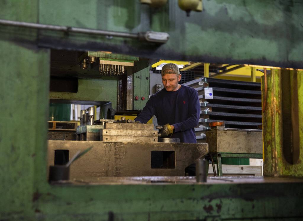 The Detroit special, built to press out car bumpers is now used to stamp holes in heavy gauge steel on Thursday, Oct. 3, 2024 in Mukilteo, Washington. (Olivia Vanni / The Herald)