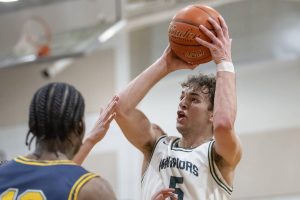 Edmonds-Woodway’s Cam Hiatt makes a jump shot during the game against Shorecrest on Tuesday, Jan. 28, 2025 in Edmonds, Washington. (Olivia Vanni / The Herald)