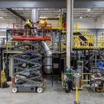 Construction contractors add exhaust pipes for Century’s liquid metal walls at Zap Energy on Monday, Feb. 3, 2025 in Everett, Washington. (Olivia Vanni / The Herald)