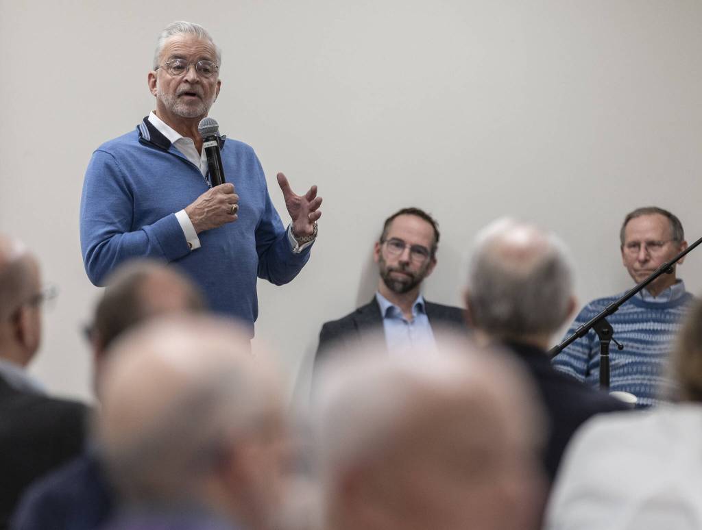 Edmonds Civic Roundtable Board Chair Gil Morgan introduces those presenting during the Edmonds Civic Roundtable event about the RFA annexation vote on Monday, Feb. 10, 2025 in Edmonds, Washington. (Olivia Vanni / The Herald)