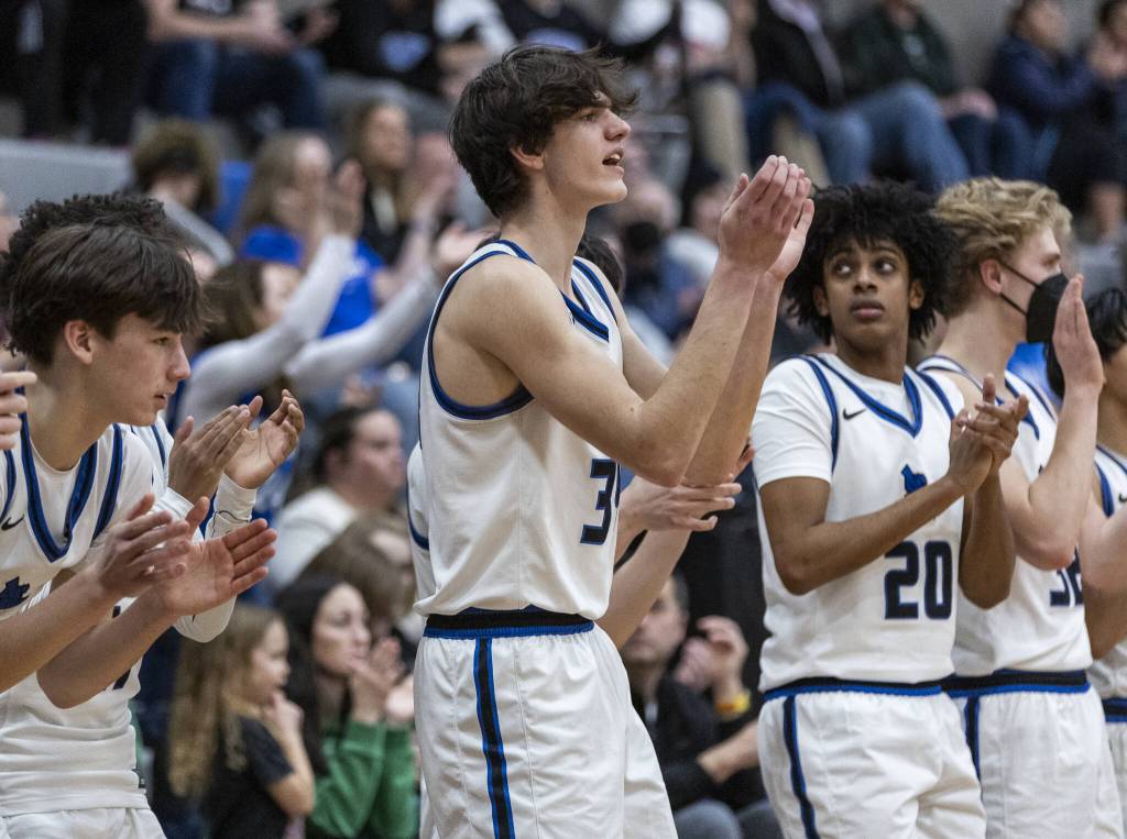 The Shorewood bench reacts to a score during the game against Edmonds-Woodway on Tuesday, Feb. 4, 2025 in Shoreline, Washington. (Olivia Vanni / The Herald)